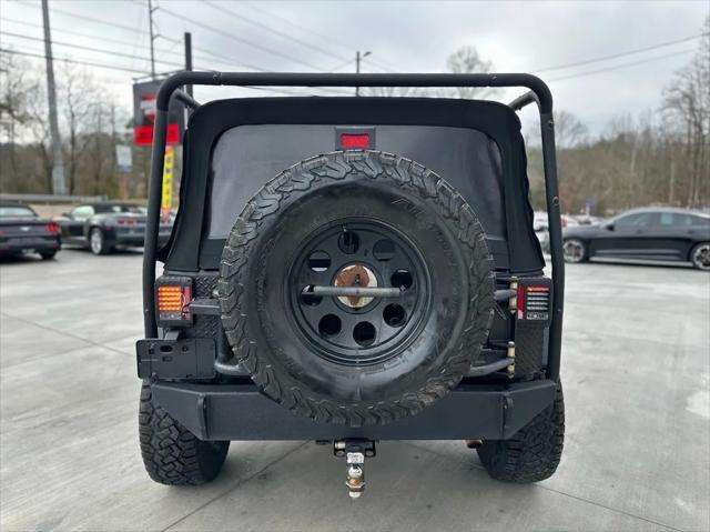 used 2013 Jeep Wrangler Unlimited car, priced at $14,999