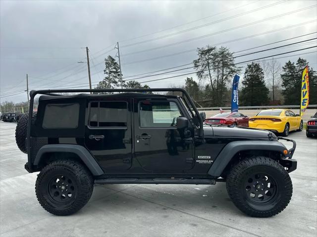 used 2013 Jeep Wrangler Unlimited car, priced at $14,999