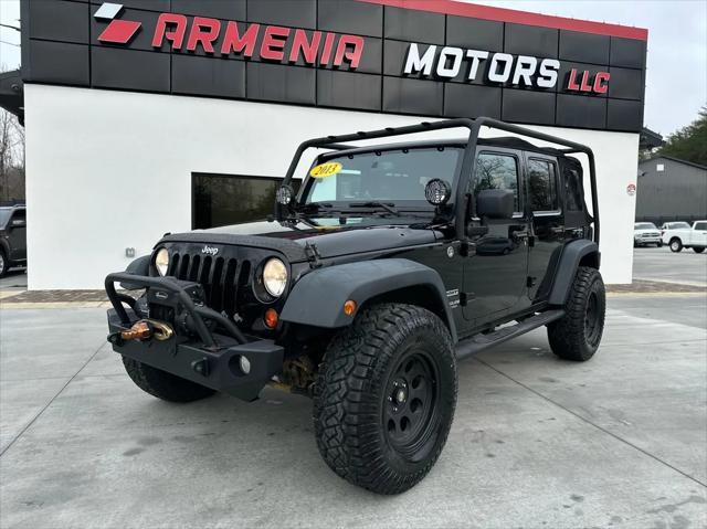 used 2013 Jeep Wrangler Unlimited car, priced at $14,999