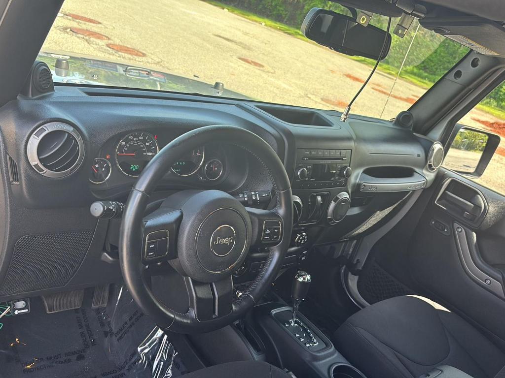 used 2014 Jeep Wrangler car, priced at $16,399