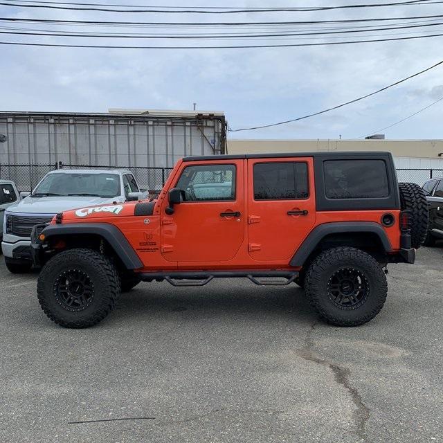 used 2015 Jeep Wrangler Unlimited car, priced at $25,509