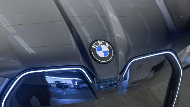 new 2026 BMW iX car, priced at $74,775