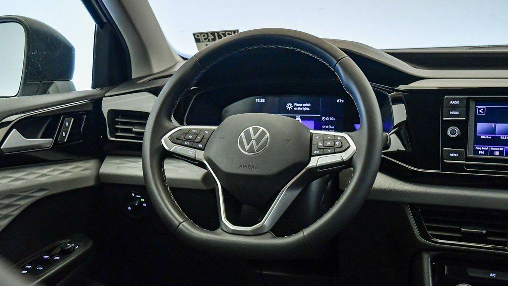used 2023 Volkswagen Taos car, priced at $17,699