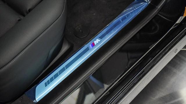new 2025 BMW 740 car, priced at $105,366