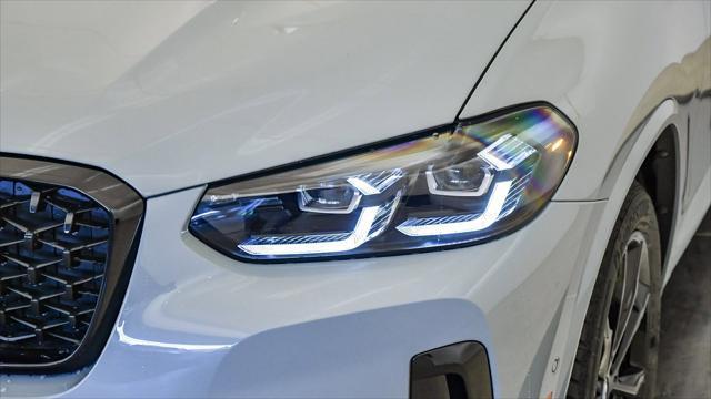 new 2025 BMW X4 car, priced at $59,196