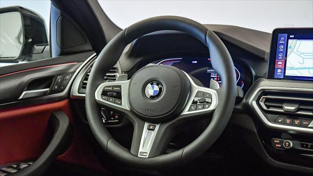 new 2025 BMW X4 car, priced at $59,196