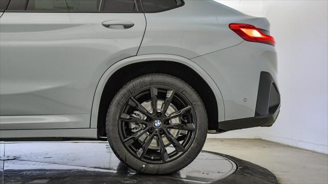 new 2025 BMW X4 car, priced at $59,196