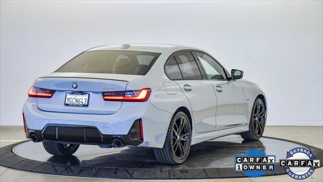 used 2023 BMW 330e car, priced at $38,099