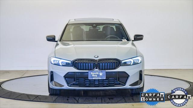 used 2023 BMW 330e car, priced at $38,099