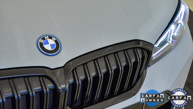 used 2023 BMW 330e car, priced at $38,099
