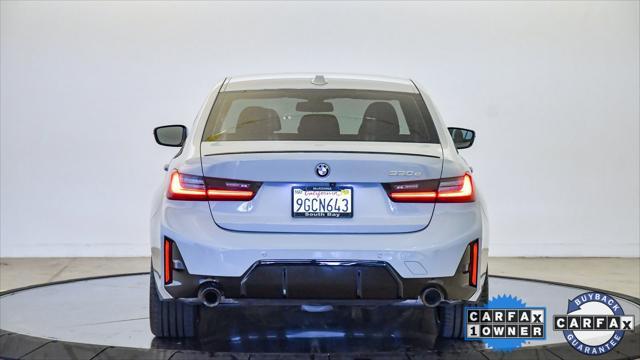 used 2023 BMW 330e car, priced at $38,099