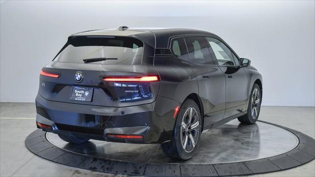 new 2026 BMW iX car, priced at $74,025