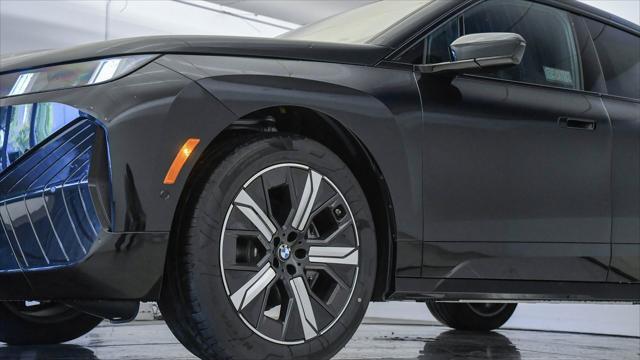 new 2026 BMW iX car, priced at $74,025