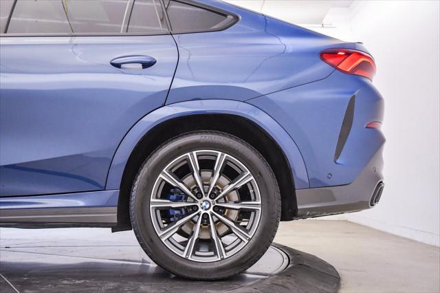 used 2022 BMW X6 car, priced at $59,999
