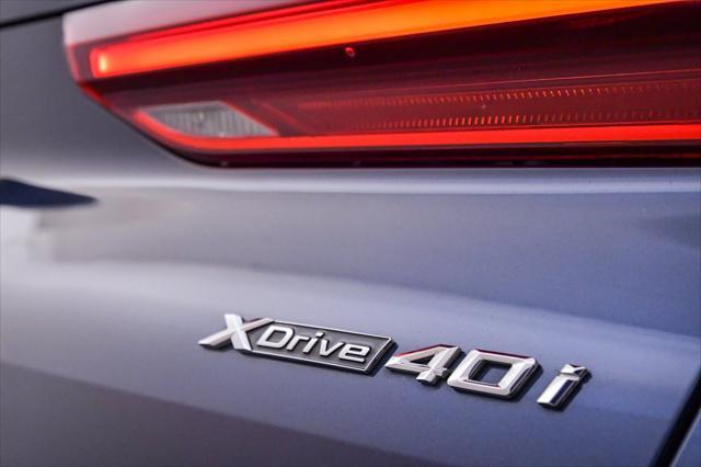 used 2022 BMW X6 car, priced at $59,999