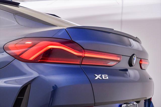 used 2022 BMW X6 car, priced at $59,999