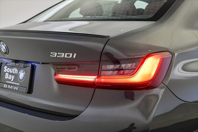 new 2025 BMW 330 car, priced at $54,275