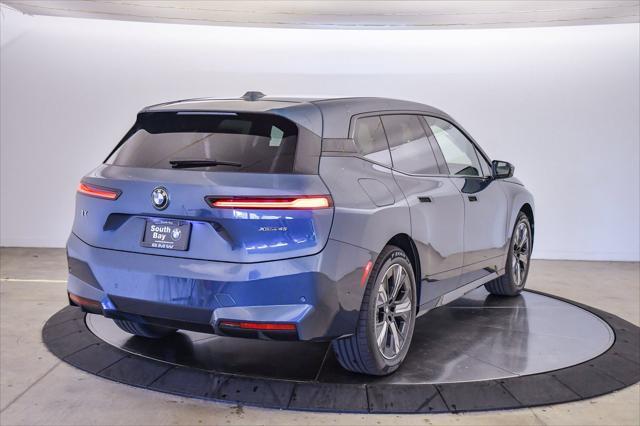 new 2026 BMW iX car, priced at $71,475