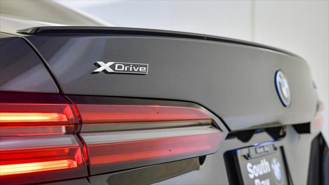 used 2025 BMW 550e car, priced at $61,399