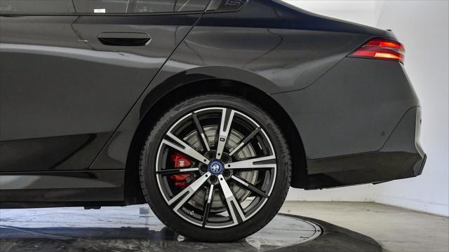 used 2025 BMW 550e car, priced at $61,399