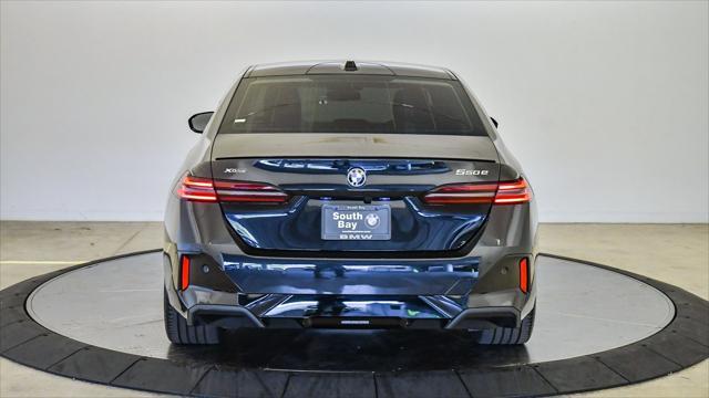 used 2025 BMW 550e car, priced at $61,399