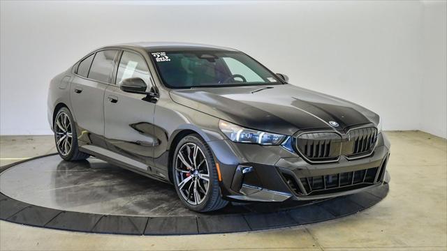 used 2025 BMW 550e car, priced at $61,399