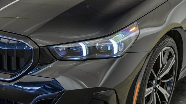 used 2025 BMW 550e car, priced at $61,399
