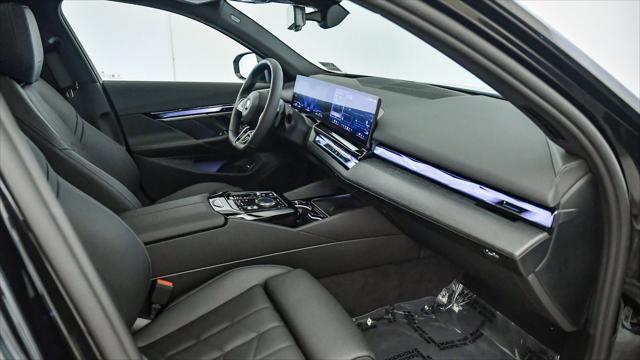 used 2025 BMW 550e car, priced at $61,399
