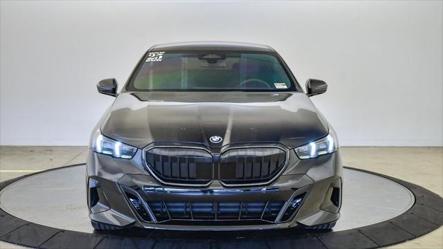 used 2025 BMW 550e car, priced at $61,399