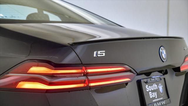 new 2025 BMW i5 car, priced at $67,319