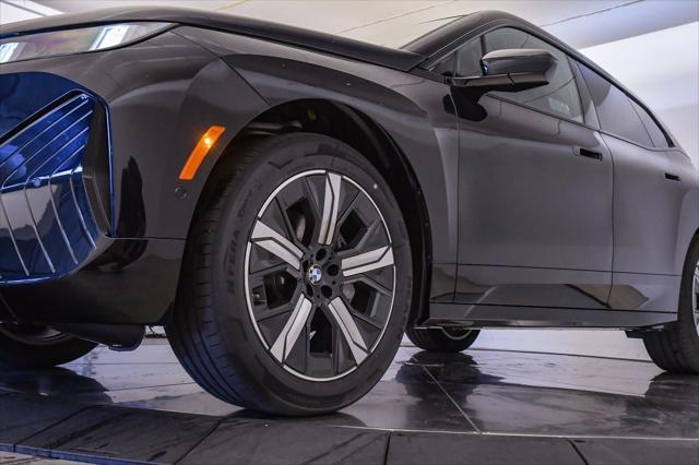 new 2026 BMW iX car, priced at $90,975