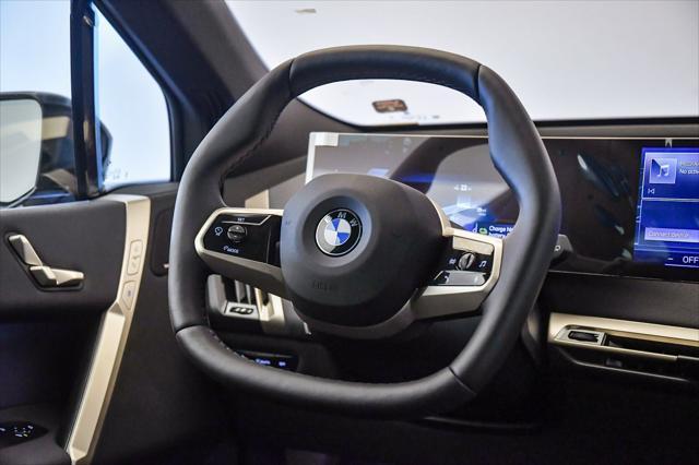 new 2026 BMW iX car, priced at $90,975