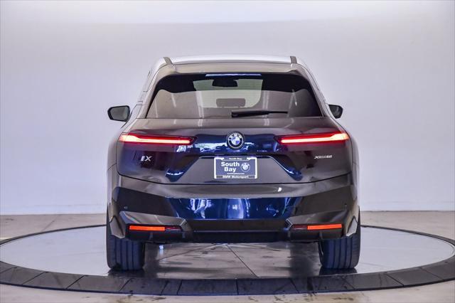 new 2026 BMW iX car, priced at $90,975