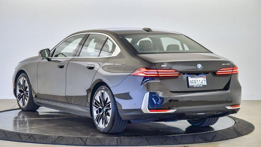 used 2025 BMW i5 car, priced at $74,895