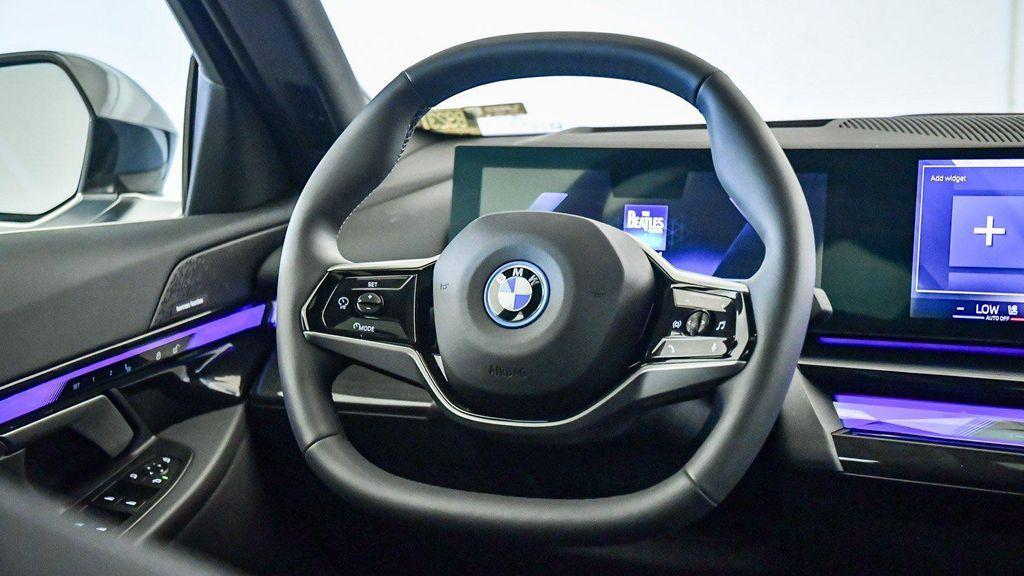 used 2025 BMW i5 car, priced at $74,895