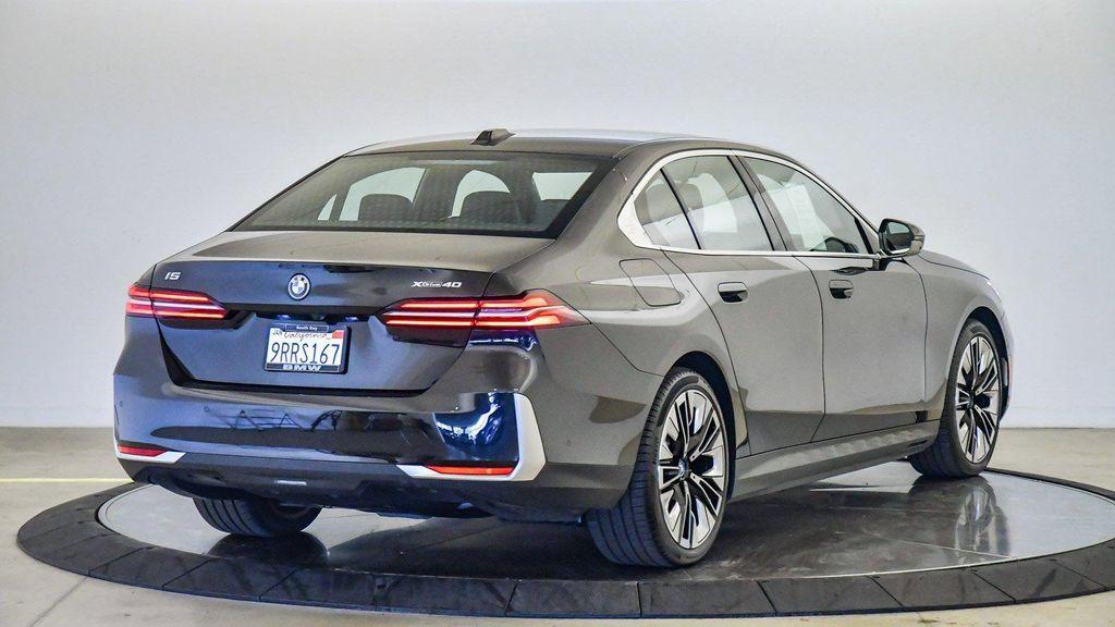 used 2025 BMW i5 car, priced at $74,895