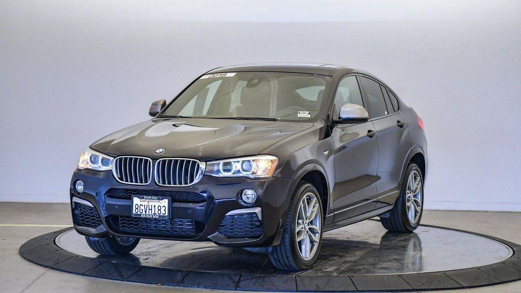used 2018 BMW X4 car, priced at $23,599