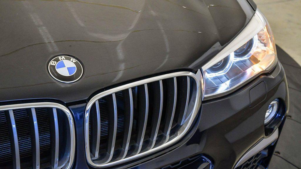 used 2018 BMW X4 car, priced at $23,478