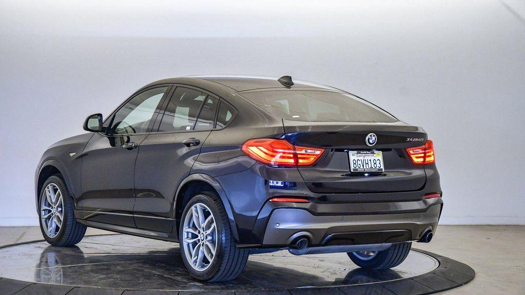 used 2018 BMW X4 car, priced at $23,478