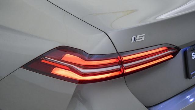 new 2025 BMW i5 car, priced at $66,321