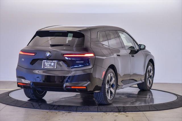 new 2026 BMW iX car, priced at $90,975