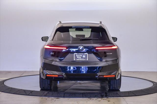 new 2026 BMW iX car, priced at $90,975