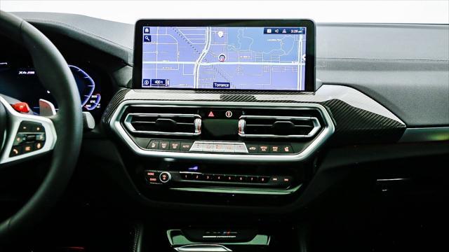 new 2025 BMW X4 M car, priced at $93,690