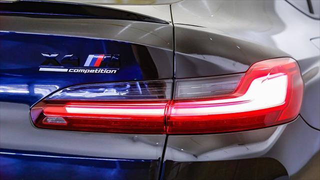 new 2025 BMW X4 M car, priced at $93,690