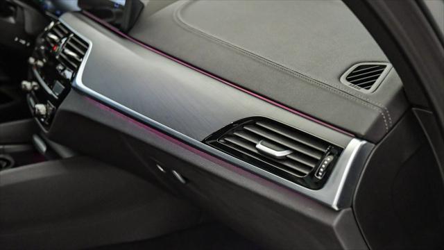 used 2023 BMW M550 car, priced at $61,999