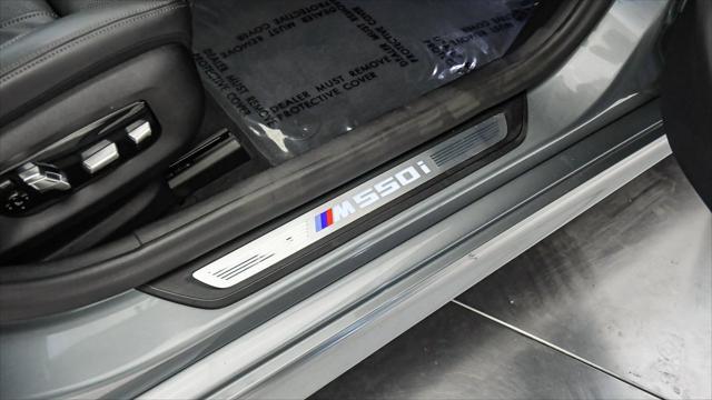 used 2023 BMW M550 car, priced at $61,999