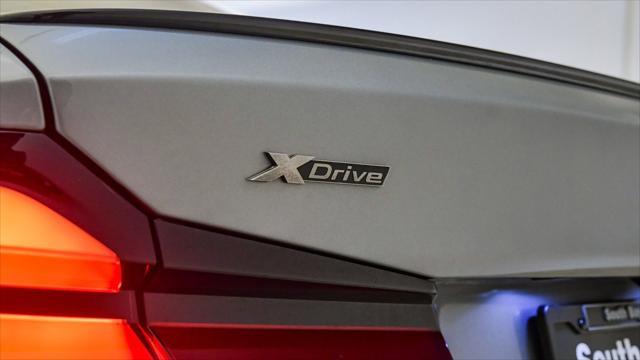 used 2023 BMW M550 car, priced at $61,999