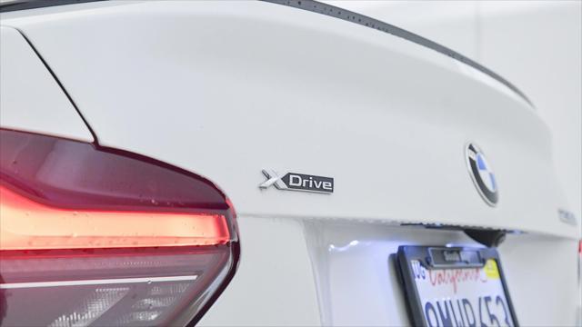 used 2024 BMW 230 car, priced at $48,945