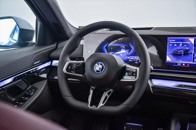 new 2025 BMW i5 car, priced at $70,122