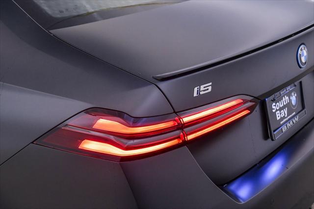 new 2025 BMW i5 car, priced at $70,122